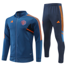KIT GIACCA BLU ARANCIONE + TUTA MANCHESTER UNITED 2022/23